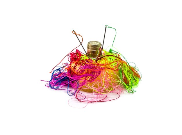 colorful thread skeins and needles