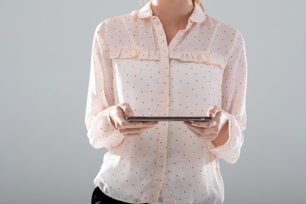 customer hands holding embroidered cloth